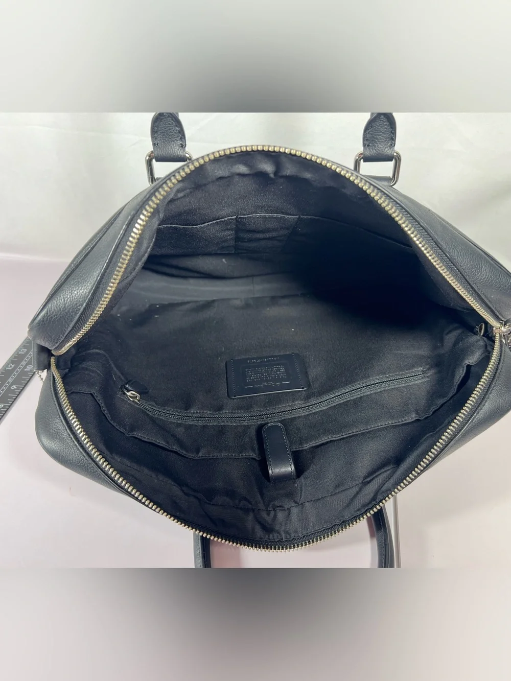 4099: NWT Coach Beckett Slim Brief Black Leather Laptop Bag Scratched Side